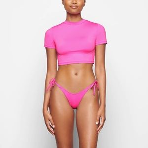 Skims swimming top